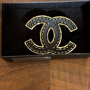 Elegant Black and Gold Designer brooch.